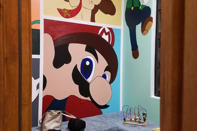 Exemple d'une petite chambre d'enfant de 4 à 10 ans éclectique avec un mur multicolore, moquette et un sol bleu.