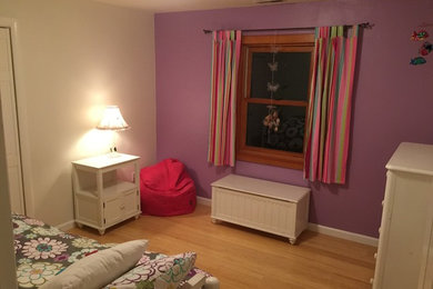 This is an example of a contemporary kids' bedroom in Other.