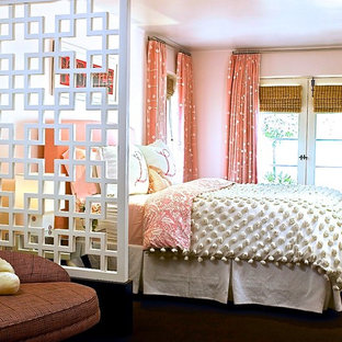 Kids' room - contemporary girl carpeted kids' room idea in Los Angeles with pink walls