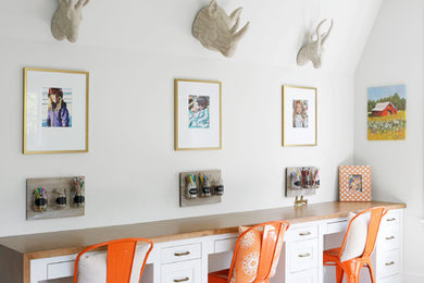 Transitional gender-neutral carpeted and beige floor kids' room photo in Nashville with white walls