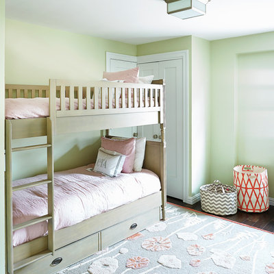 Kids' room - mid-sized traditional girl dark wood floor kids' room idea in New York with green walls