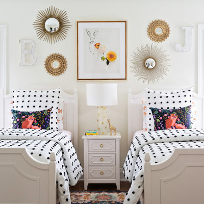 Large transitional gender-neutral light wood floor and brown floor kids' room photo in Orlando with white walls