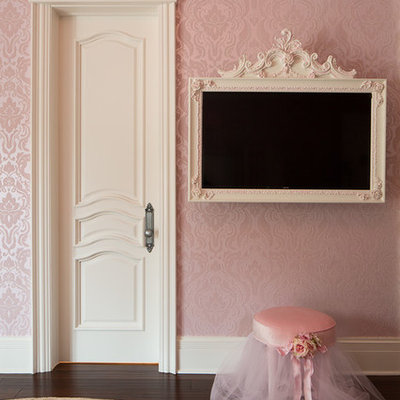 Kids' bedroom - transitional girl dark wood floor kids' bedroom idea in Chicago with pink walls