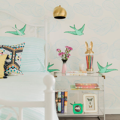 Large transitional girl brown floor and dark wood floor kids' room photo in New York with multicolored walls
