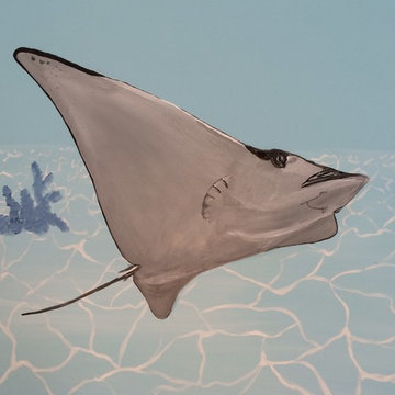 Large stingray gliding in the ocean.