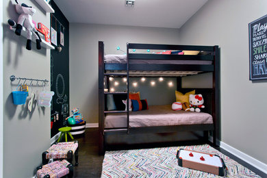 Small trendy dark wood floor childrens' room photo in Las Vegas with gray walls
