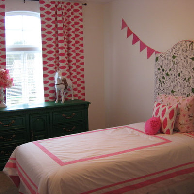 Kids' room - eclectic girl carpeted kids' room idea in Portland with white walls