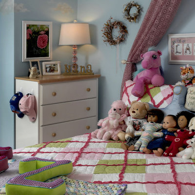 Kids' room - traditional girl kids' room idea in DC Metro with blue walls