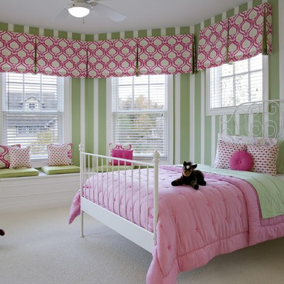 Example of a classic girl carpeted kids' room design in Detroit with multicolored walls