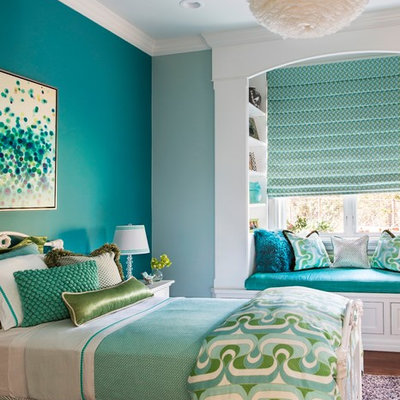 Inspiration for a mid-sized transitional girl kids' room remodel in San Francisco with blue walls