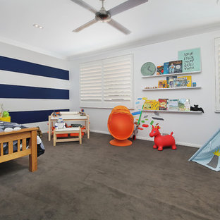 Design ideas for a contemporary kids' bedroom for boys in Sydney with multi-coloured walls, carpet and grey floor.