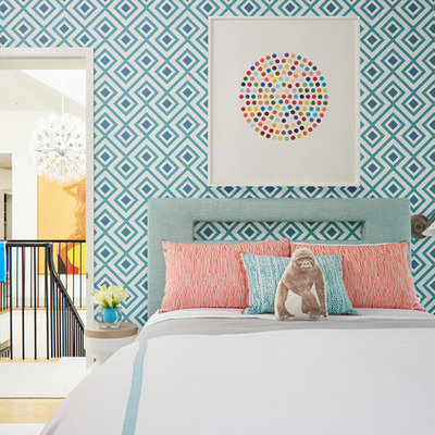 Inspiration for a mid-sized transitional girl light wood floor and beige floor kids' room remodel in San Francisco with multicolored walls