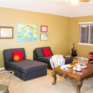 Example of a large classic boy kids' room design in Houston with yellow walls