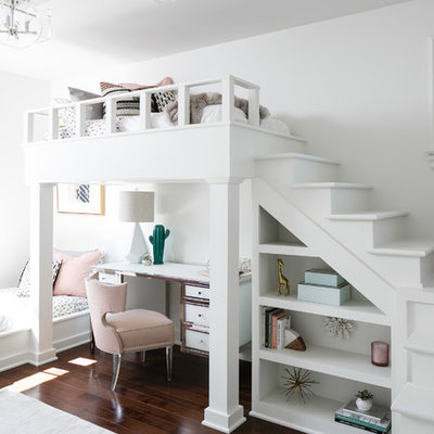 Inspiration for a mid-sized transitional girl brown floor and dark wood floor kids' room remodel in Louisville with white walls