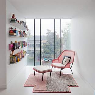 Inspiration for a contemporary kids' playroom in Melbourne with white walls and white floor.