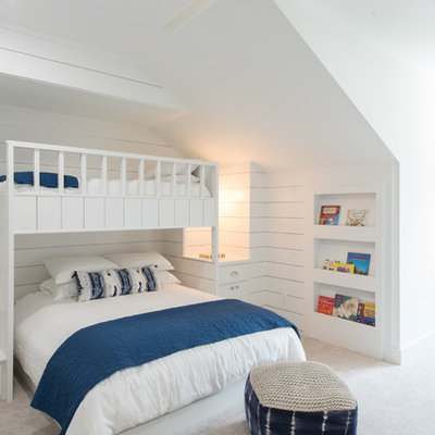 Beach style gender-neutral carpeted and gray floor kids' bedroom photo in Houston with white walls