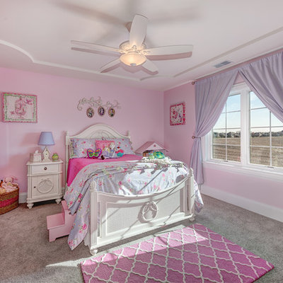 Inspiration for a large timeless girl carpeted and gray floor kids' room remodel in Chicago with pink walls