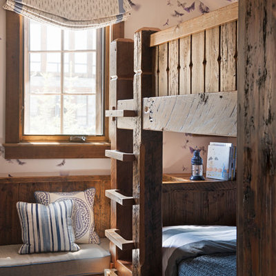 Example of a mid-sized mountain style gender-neutral carpeted kids' bedroom design in San Francisco with multicolored walls