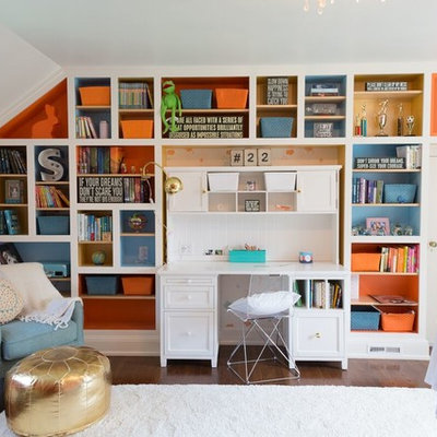 Inspiration for a mid-sized timeless girl dark wood floor kids' room remodel in Philadelphia with multicolored walls