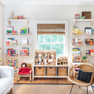 Inspiration for a country girl medium tone wood floor kids' room remodel in Boston with white walls
