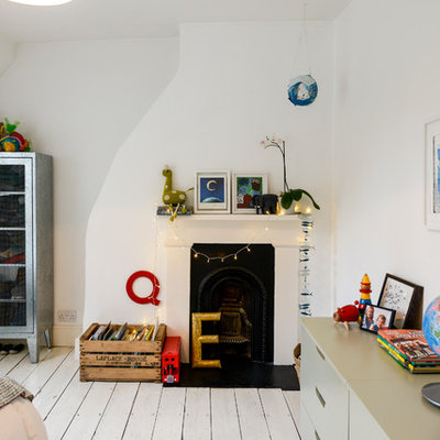 Inspiration for an eclectic painted wood floor and white floor kids' bedroom remodel in London