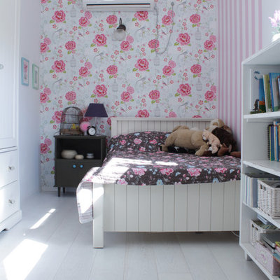 Kids' bedroom - eclectic girl painted wood floor and white floor kids' bedroom idea in Tel Aviv with multicolored walls
