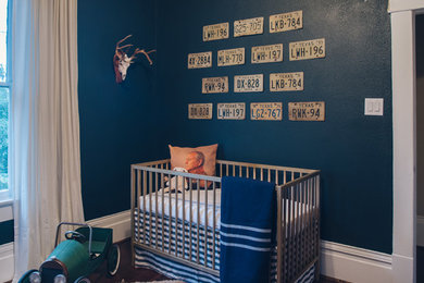 Example of an eclectic nursery design in Houston