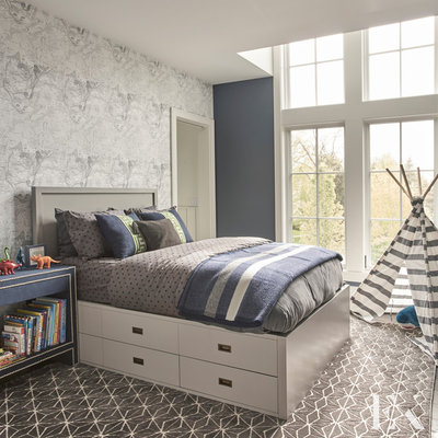 Inspiration for a mid-sized modern boy kids' room remodel in Chicago with blue walls