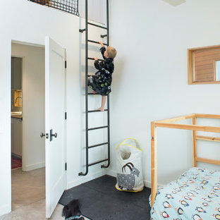 Inspiration for a contemporary boy concrete floor and gray floor kids' room remodel in Denver with white walls