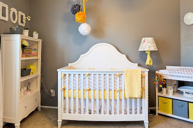 Example of a small girl carpeted kids' room design in Other with gray walls