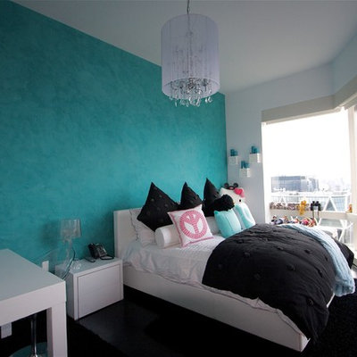 Kids' room - large modern girl dark wood floor and black floor kids' room idea in Los Angeles with blue walls