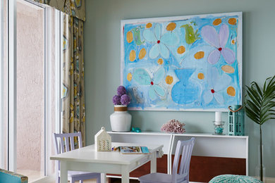 Example of a transitional kids' room design in Miami with blue walls