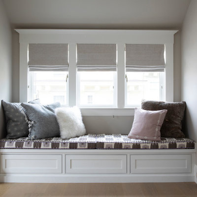 Mid-sized transitional girl light wood floor kids' room photo in San Francisco with gray walls