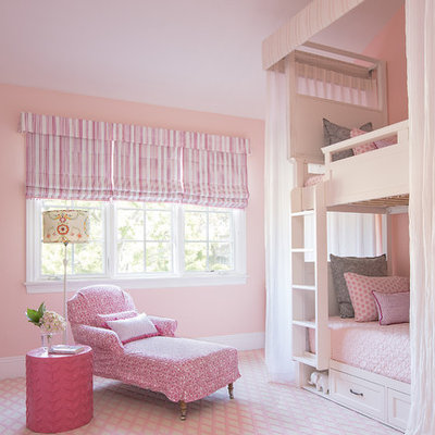 Inspiration for a large transitional girl carpeted and pink floor kids' room remodel in Los Angeles with pink walls