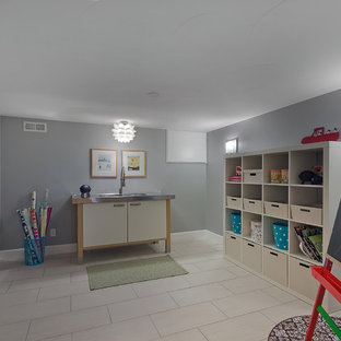 Inspiration for a timeless white floor playroom remodel in Denver