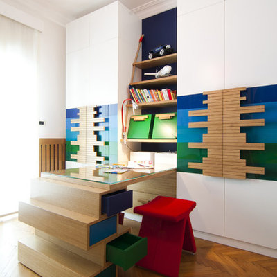 Trendy gender-neutral medium tone wood floor kids' study room photo in Other with white walls