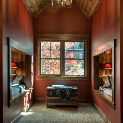 Inspiration for a rustic gender-neutral carpeted and gray floor kids' bedroom remodel in Minneapolis with red walls
