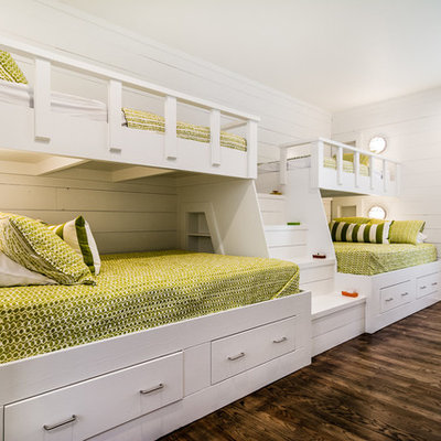 Kids' bedroom - coastal dark wood floor and brown floor kids' bedroom idea in Other with white walls
