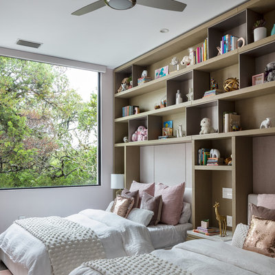 Inspiration for a contemporary girl kids' room remodel in Austin with white walls