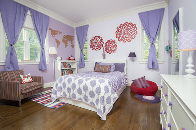 Kids' room - modern girl dark wood floor kids' room idea in Boston with purple walls