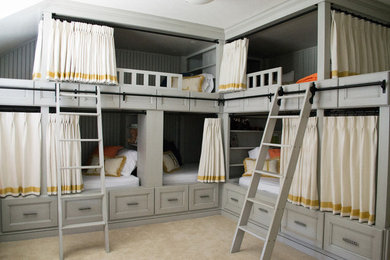 Example of a mid-sized transitional gender-neutral carpeted and beige floor kids' room design in Columbus