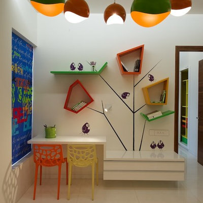 Inspiration for a contemporary gender-neutral kids' room remodel in Ahmedabad with white walls