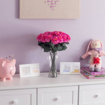 Purple and Pink Girl's Bedroom with White Furniture