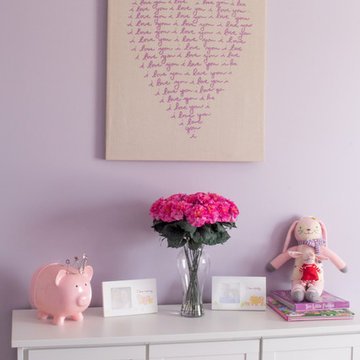 Purple and Pink Girl's Bedroom with White Furniture