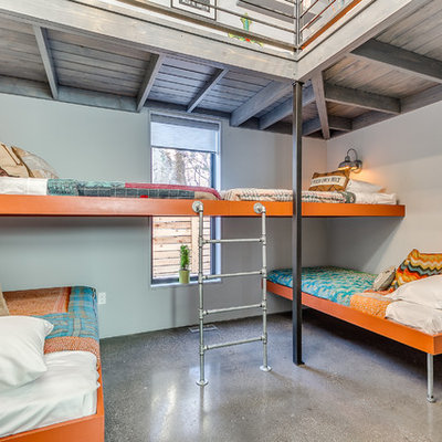 Kids' bedroom - contemporary gender-neutral concrete floor and gray floor kids' bedroom idea in Oklahoma City with gray walls