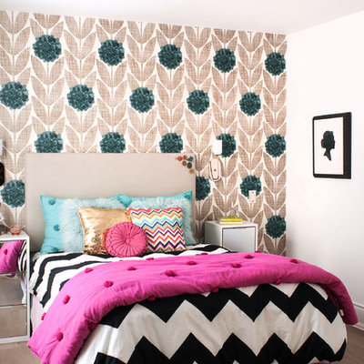 Transitional girl medium tone wood floor kids' room photo in Toronto with multicolored walls