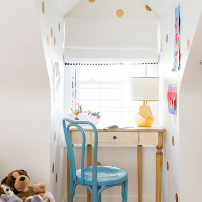 Inspiration for a transitional gender-neutral medium tone wood floor kids' study room remodel in Boston with multicolored walls