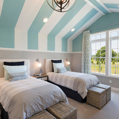 Beach style gender-neutral carpeted and gray floor kids' room photo in Newark with multicolored walls