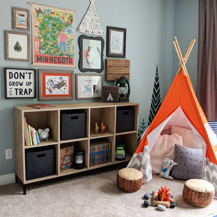 Mid-sized transitional boy carpeted and beige floor kids' room photo in Other with blue walls
