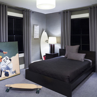Example of a mid-sized minimalist boy carpeted and gray floor kids' room design in New York with gray walls
